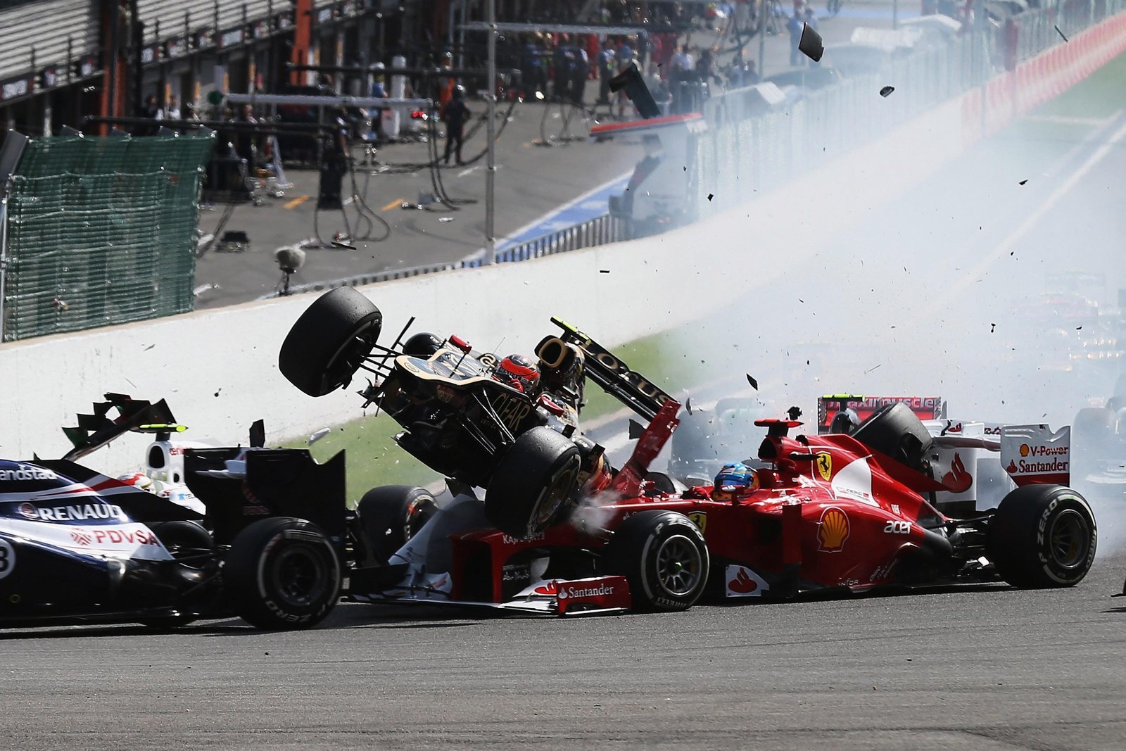 SPA, BELGIUM - SEPTEMBER 02:  In this sequence of ten frames Romain Grosjean of France and Lotus is seen being catapulted into the air as he crashes at the first corner at the start of the Belgian Grand Prix at the Circuit of Spa Francorchamps on September 2, 2012 in Spa Francorchamps, Belgium.  (Photo by Mark Thompson/Getty Images)